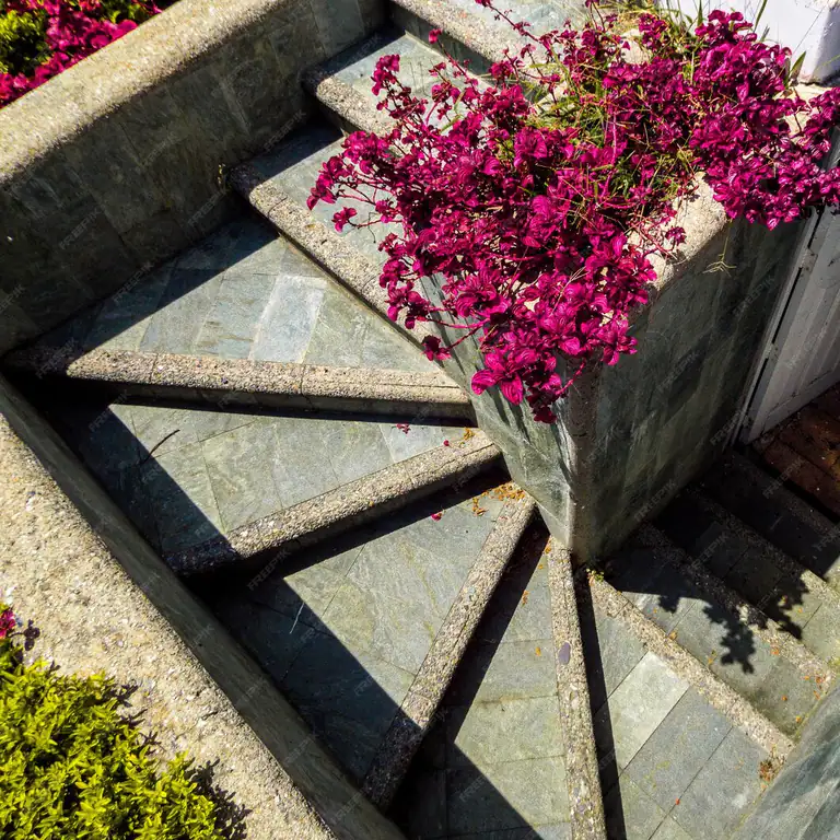 Bluestone stair treads beside flowering planters